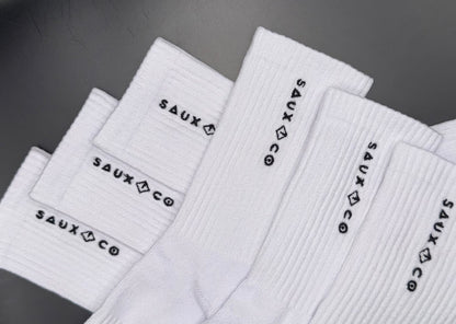 6 pairs of white crew socks flat lay photo showing full product